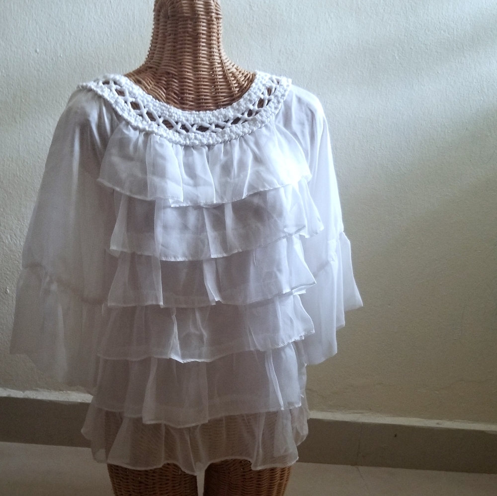Ruffle top, mint condition.